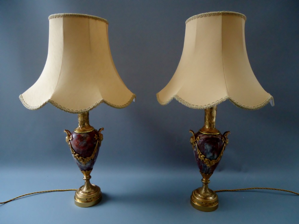 A fine pair of French  Villefranche Peach marble table lamps 