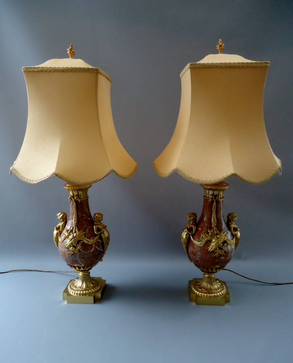A magnificent pair of French marble table lamps