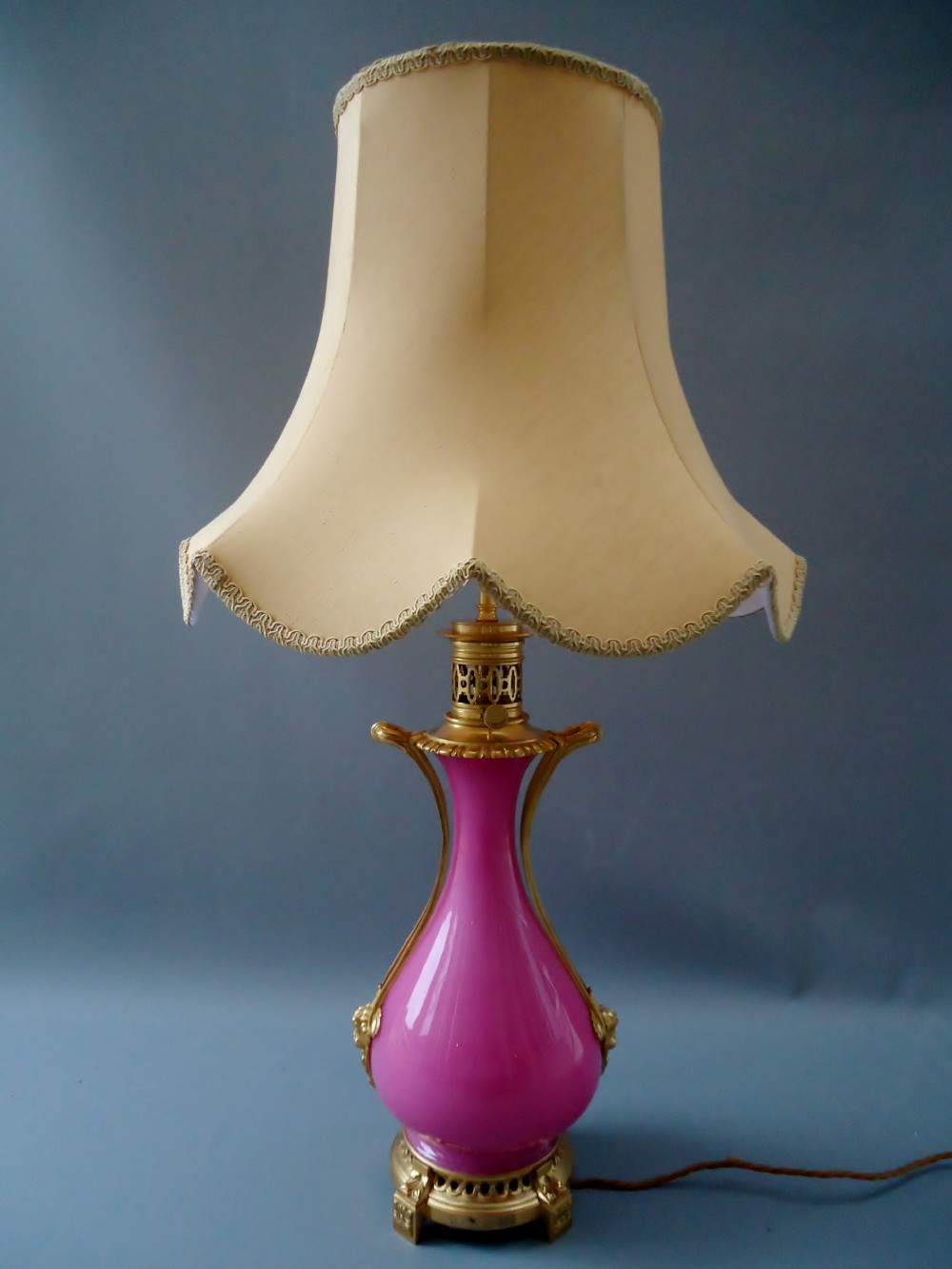 A hot pink celadon glass table lamp