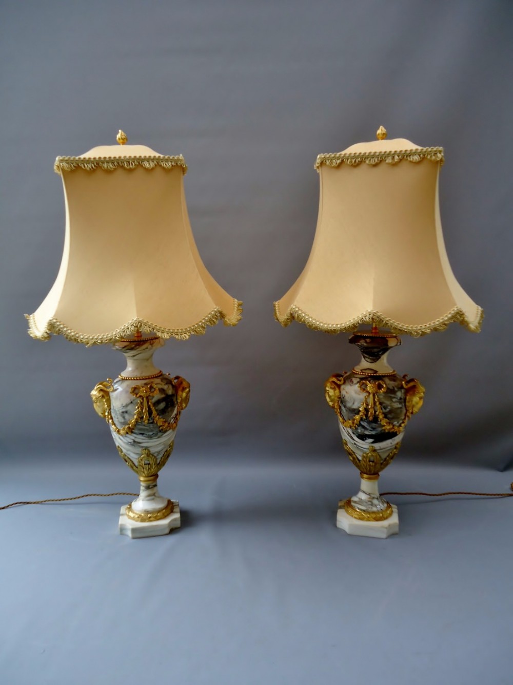 A magnificent pair of marble lamps 