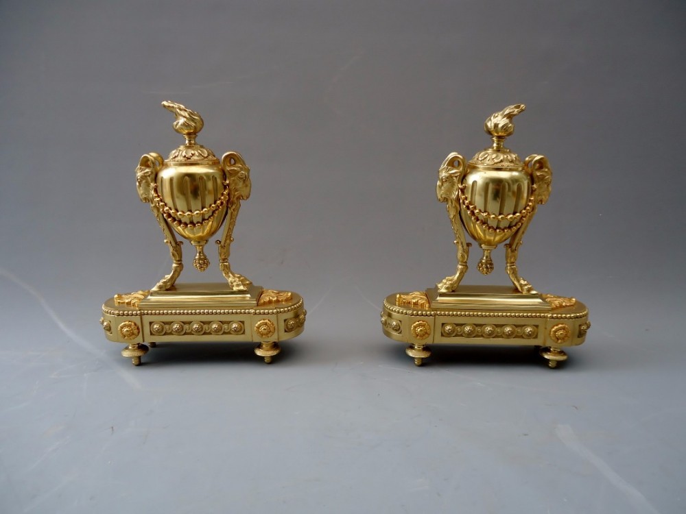 A PAIR OF ORMOLU CHENET ANDIROND FIRE DOGS 