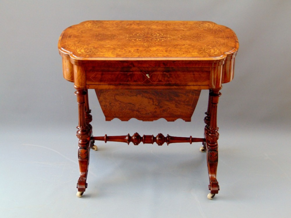 A walnut games table sewing box 