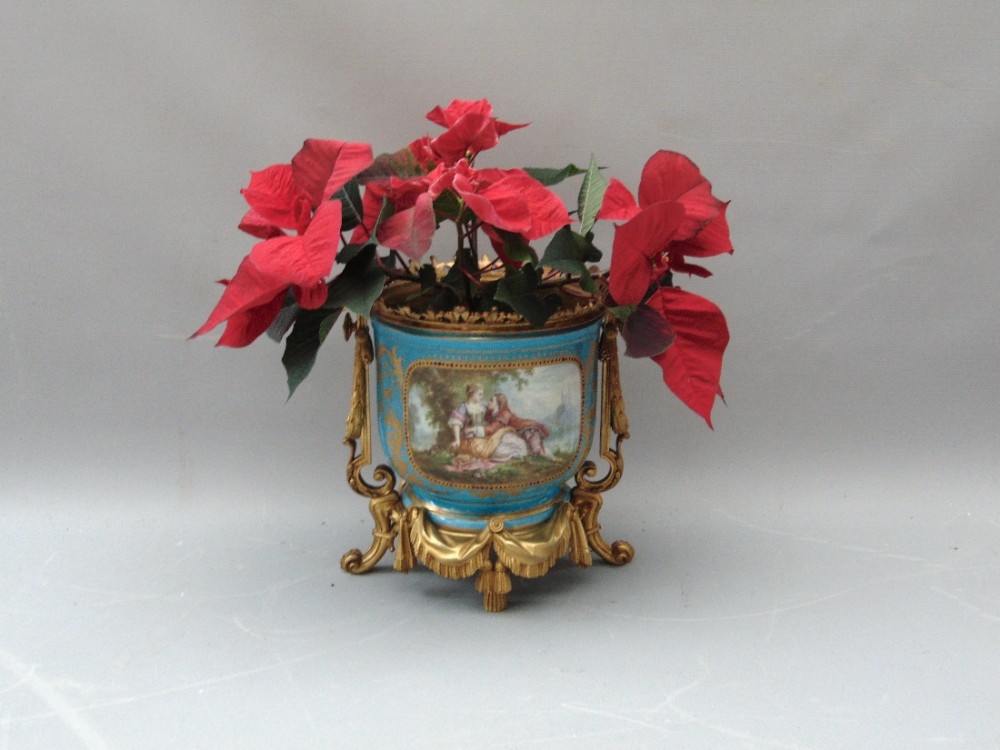 A porcelain planter jardinere