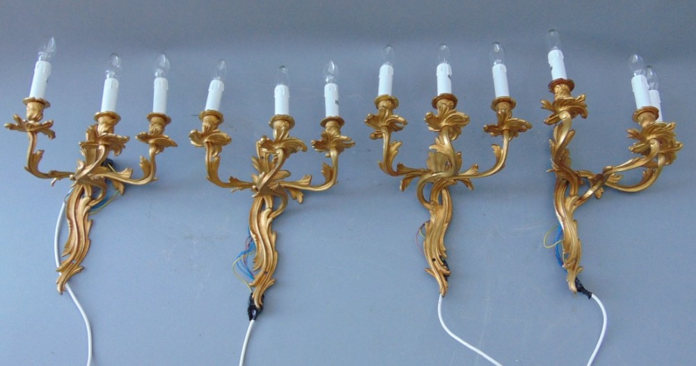 a set of four ormolu wall lights sconces