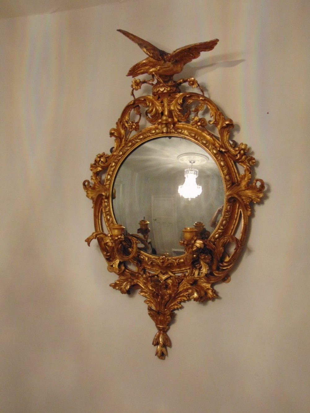 A fabulous gilt wood regency girondole mirror