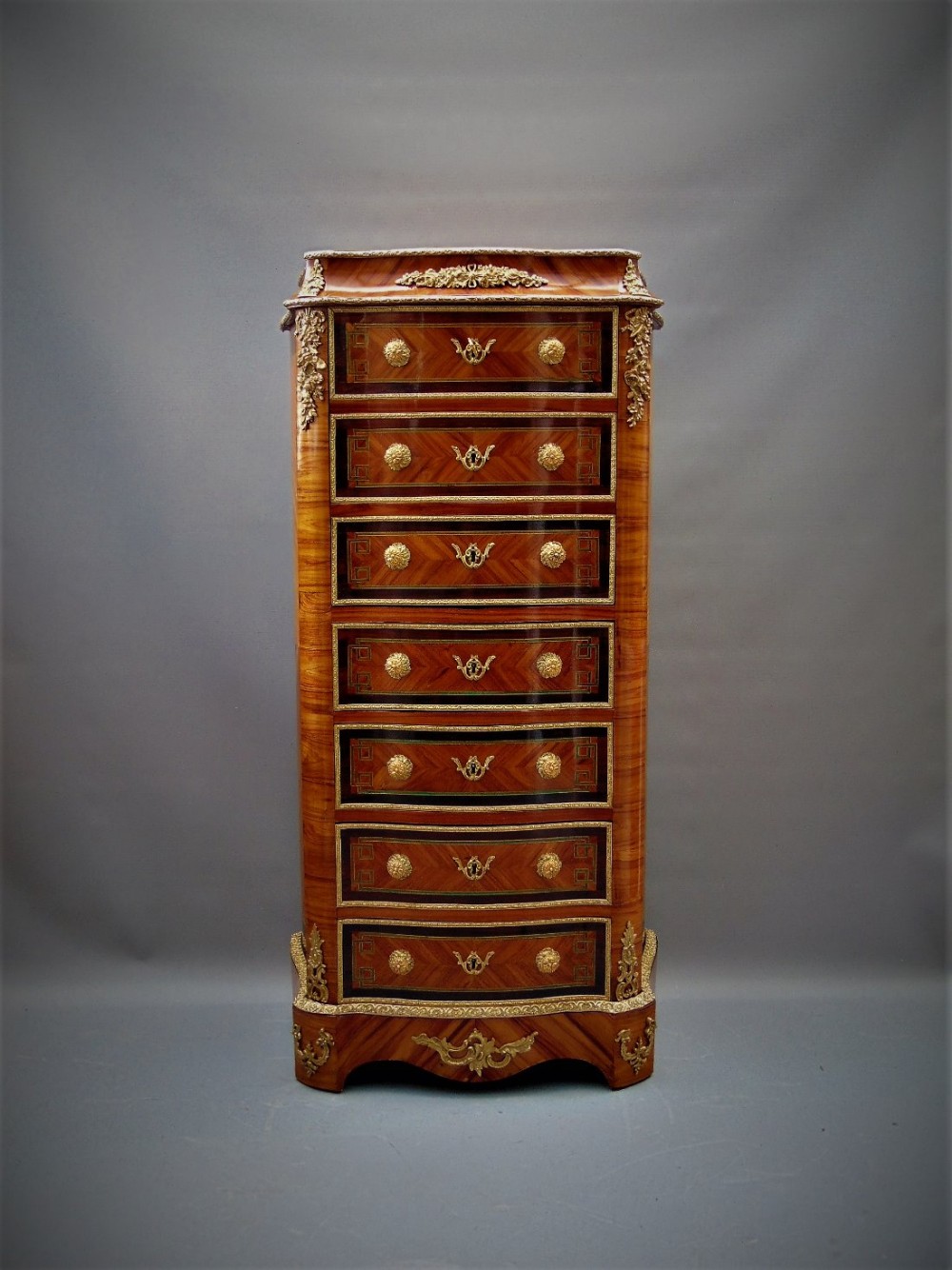 A stunning french secretaire wellington chest of drawers 