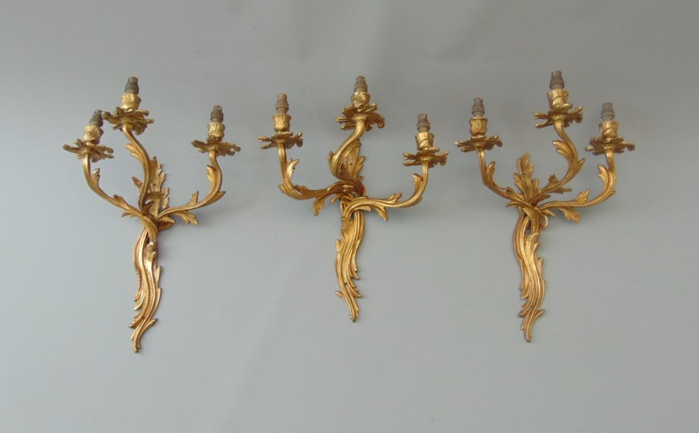 A set of three wall lights 