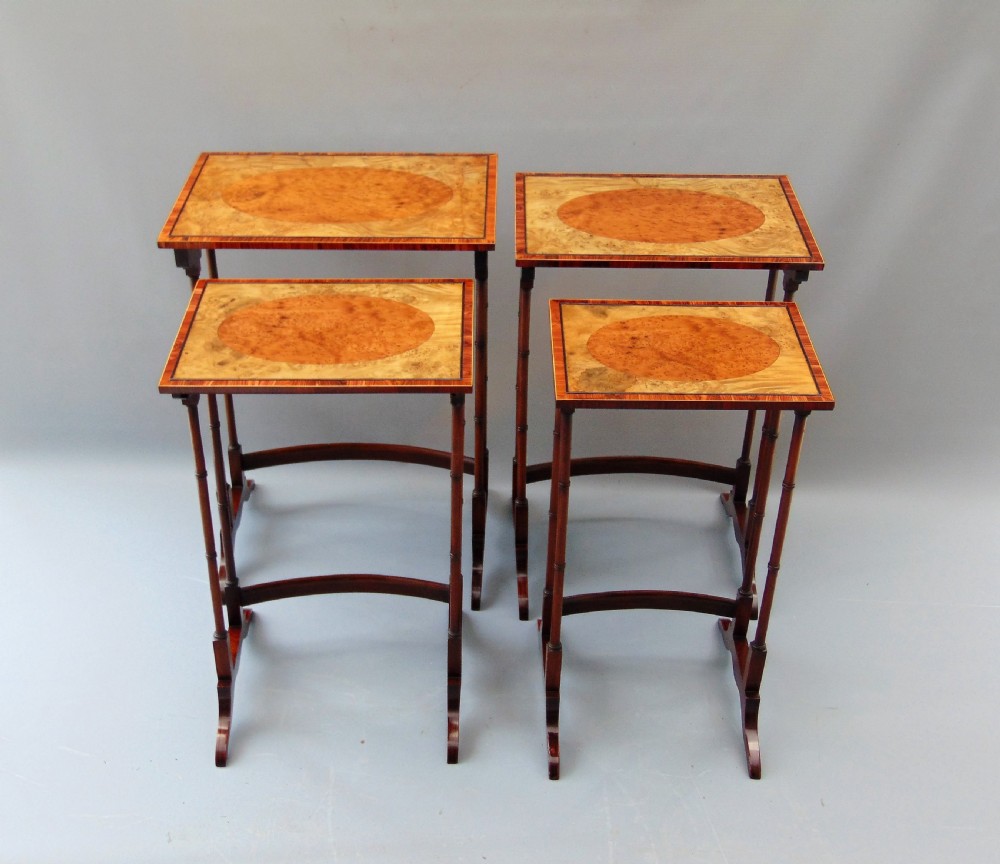 A stunning Nest Of Four Tables  View III