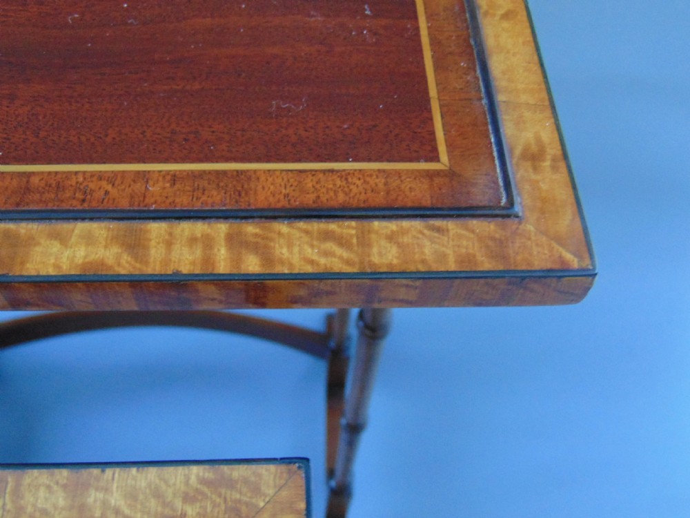 A quality  nest of four mahogany tables quartteto View IV
