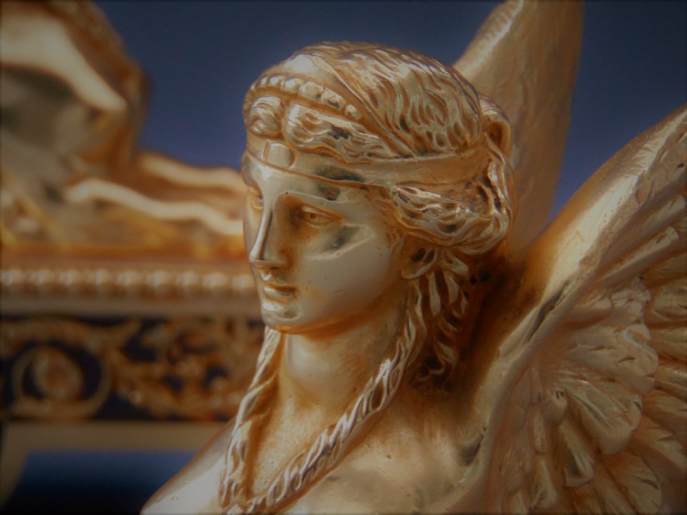 A  superb pair of ormolu chenet andirons  View V