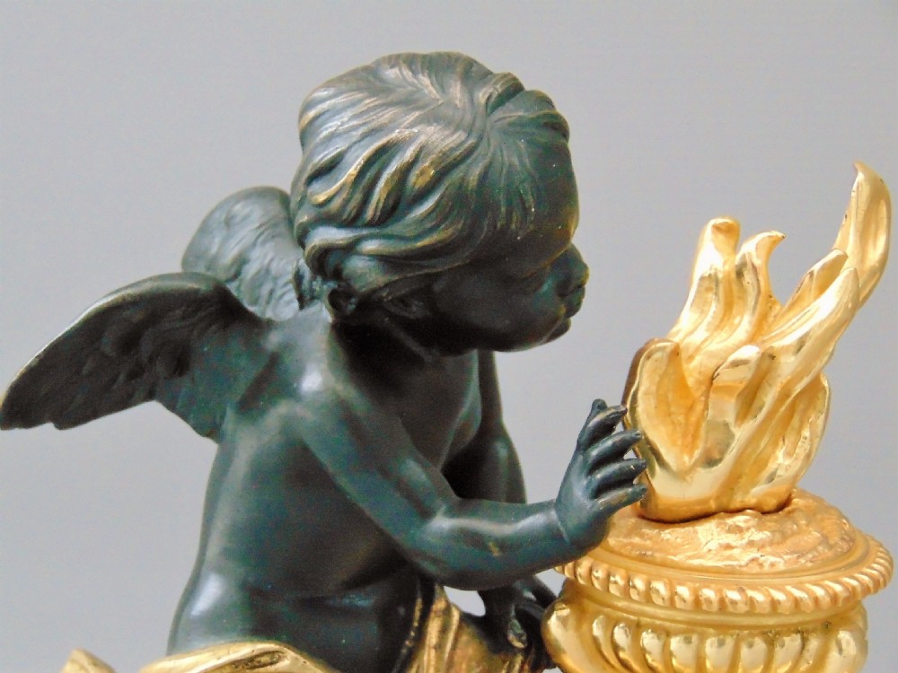 A Ormolu and Bronze  cherub chenet andiron  View IV