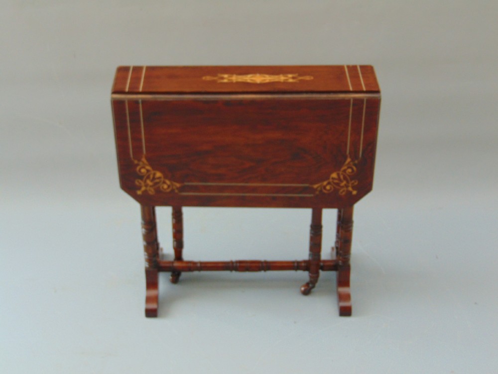A small  rosewood Sutherland table  View III