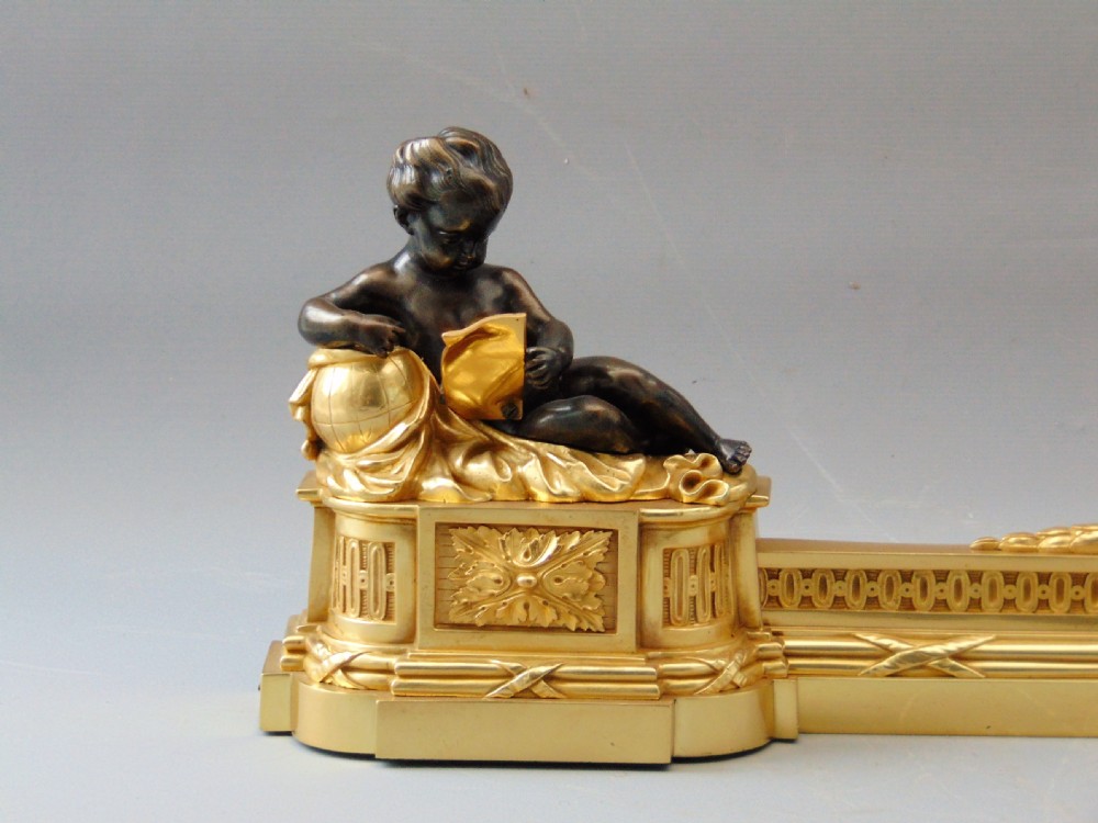 A  wonderful Pair of Ormolu and Bronze Chenets Fender  View II