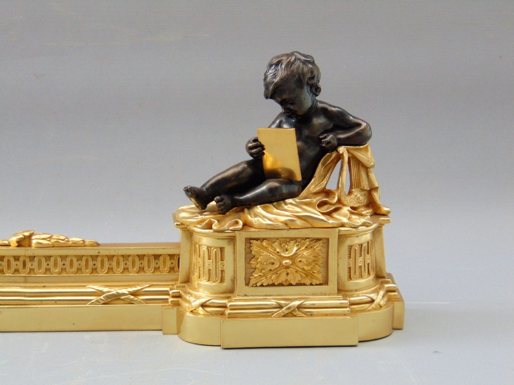 A  wonderful Pair of Ormolu and Bronze Chenets Fender  View IV