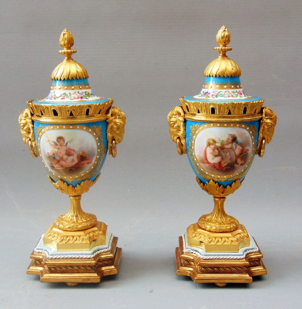 A superb Pair of Porcelain Vases with covers 