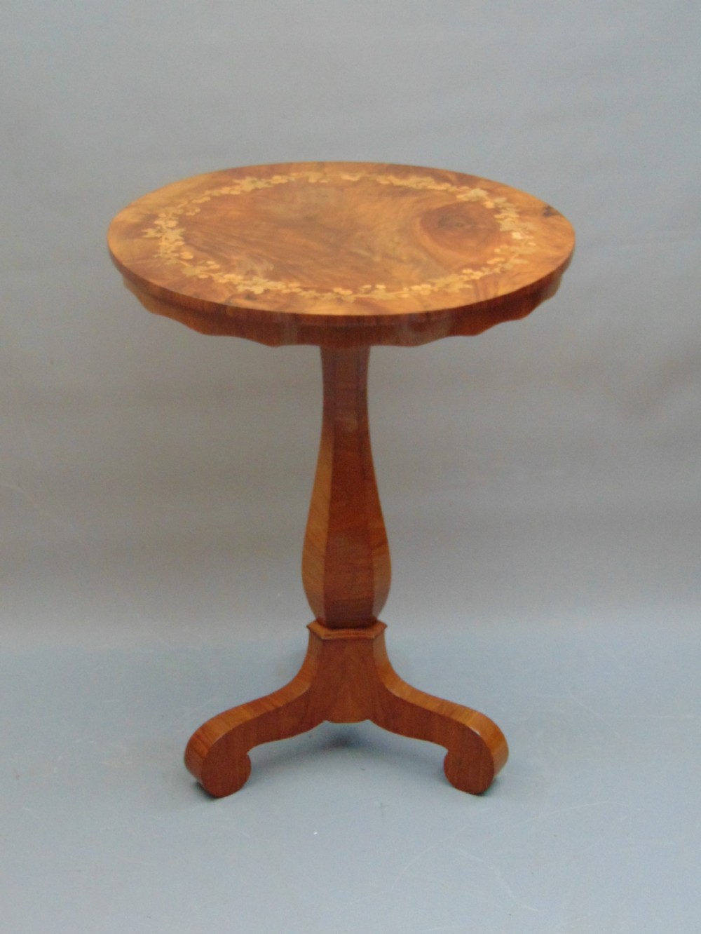 A floral marquetry walnut occasional table 