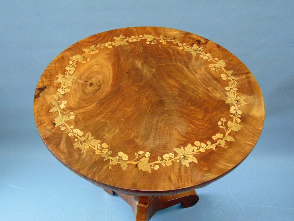 A floral marquetry walnut occasional table  View II