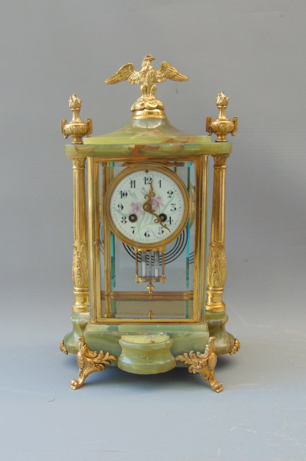 A antique four glass mantle clock