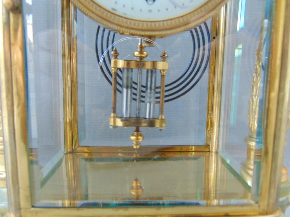 A antique four glass mantle clock View V
