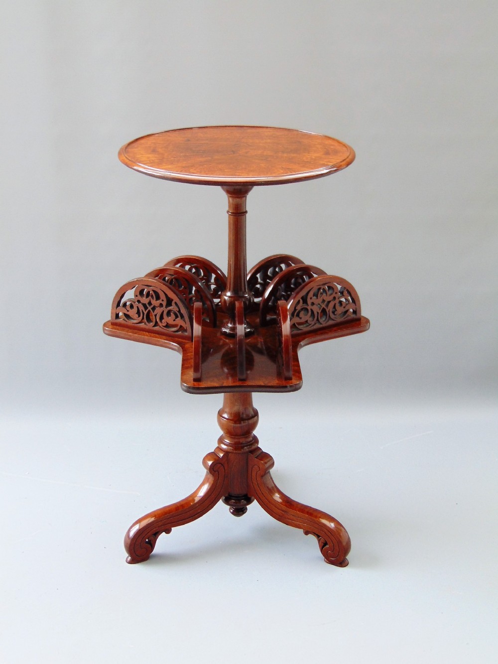 A fabulous walnut occasional book table 