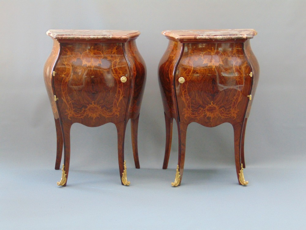 A good Pair of Walnut Bombe Side Cabinets 