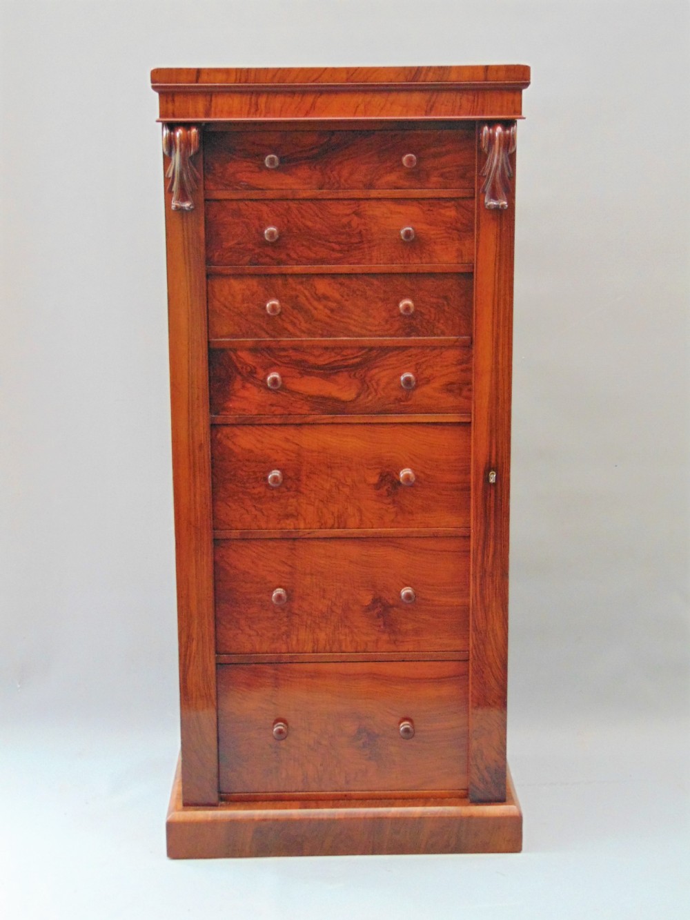 A good quality Walnut Wellington Chest