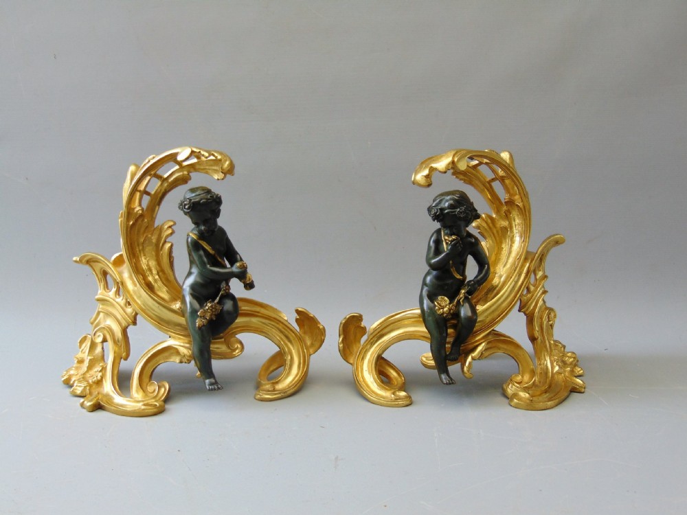 A stunning Pair of Chenet fire SIDE ANDIRONS 
