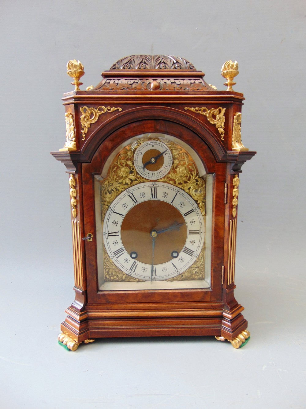 A Walnut Mantle Clock 
