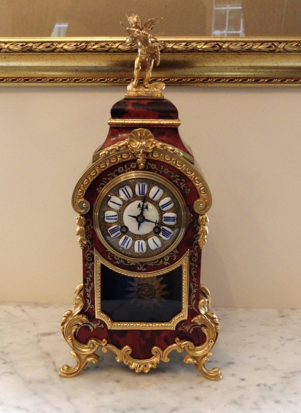 Antique red boulle mantle clock