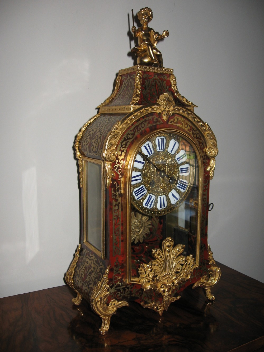 Antique red boulle mantle clock