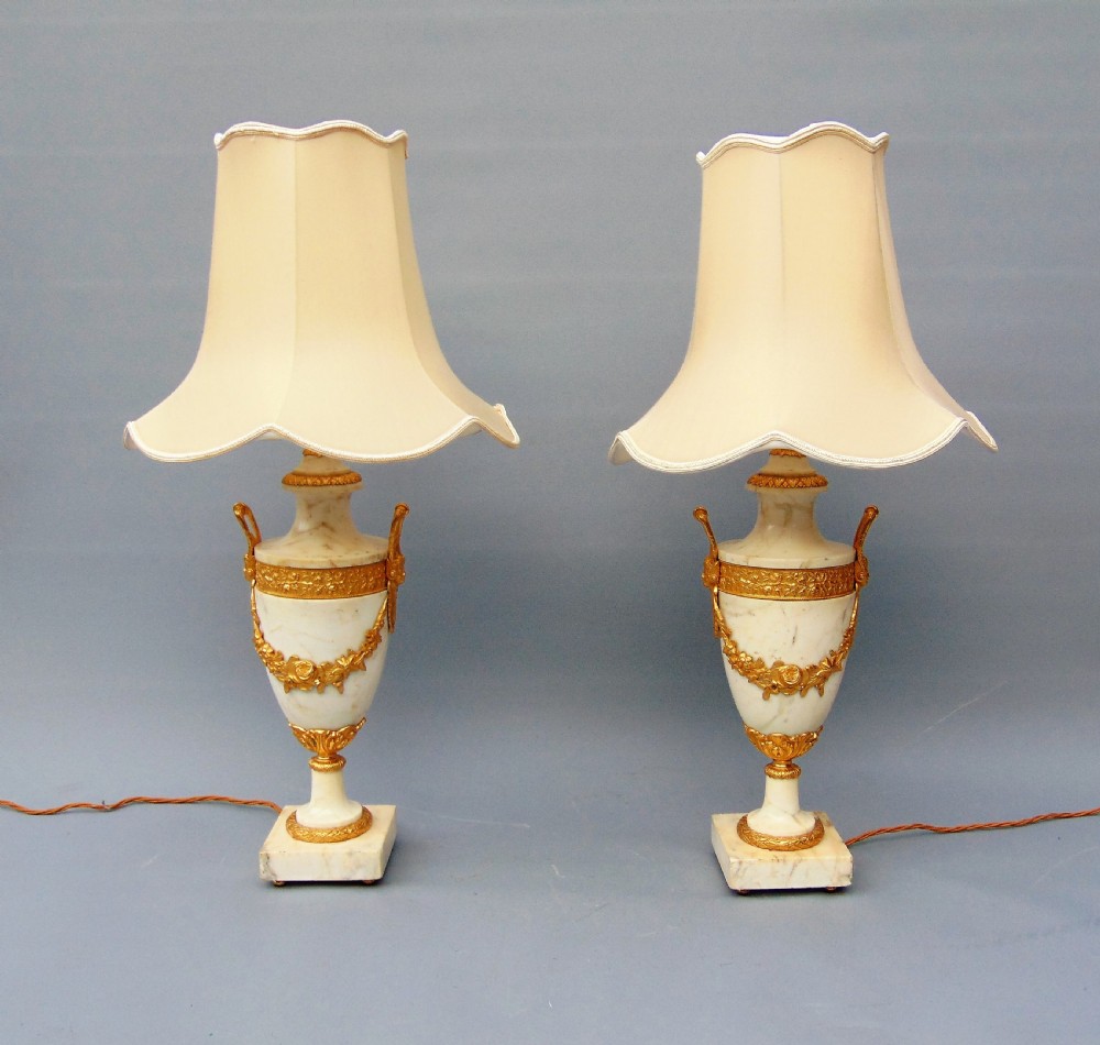 A superb pair of white marble table lamps 