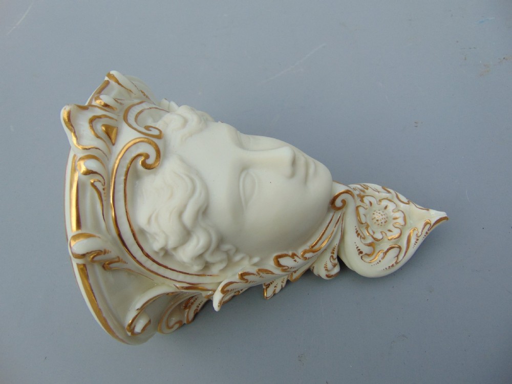 A pair of wall brackets  View IV