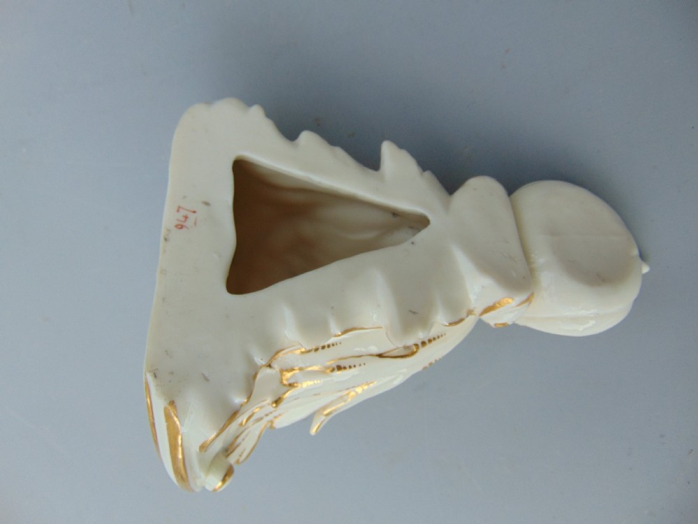 A pair of wall brackets  View V