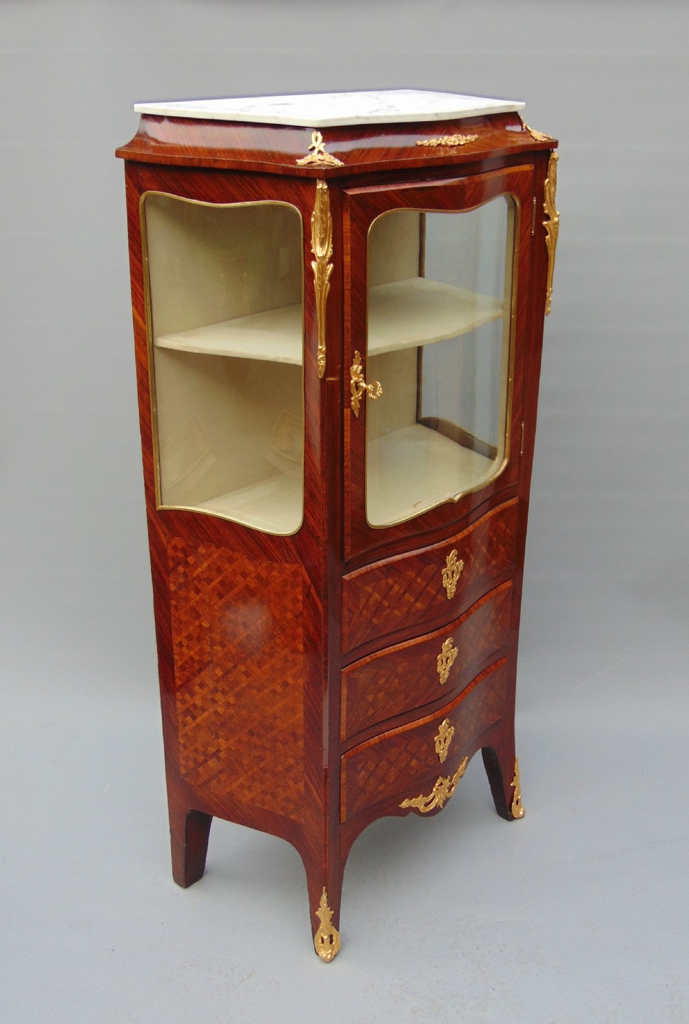 A small rosewood display cabinet  View II