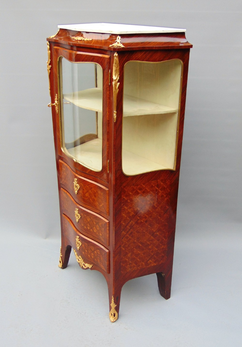 A small rosewood display cabinet  View III