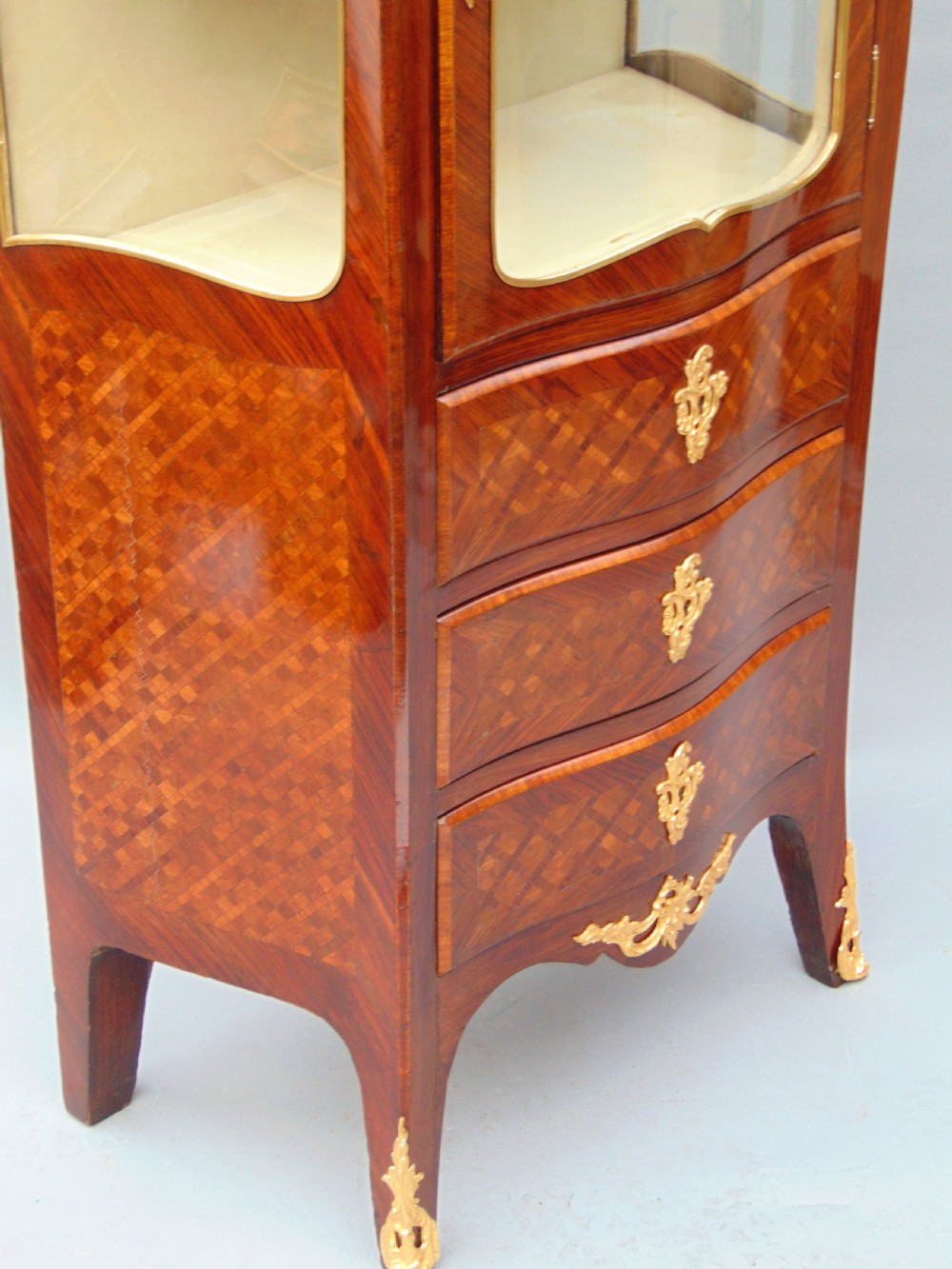 A small rosewood display cabinet  View IV