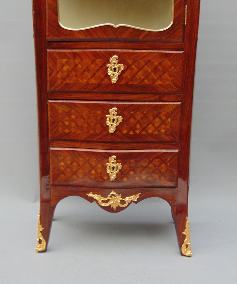 A small rosewood display cabinet  View V