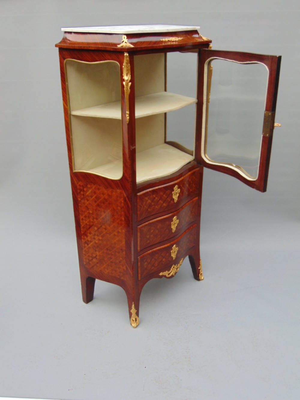 A small rosewood display cabinet  View VI