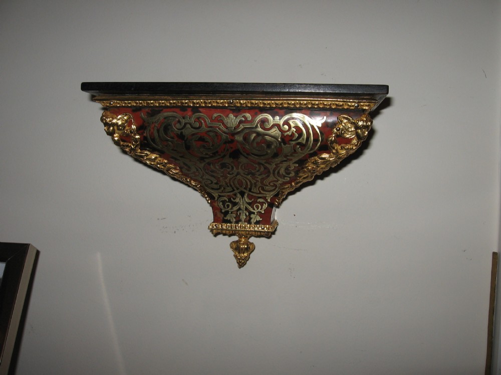 Antique red boulle clock and bracket View II