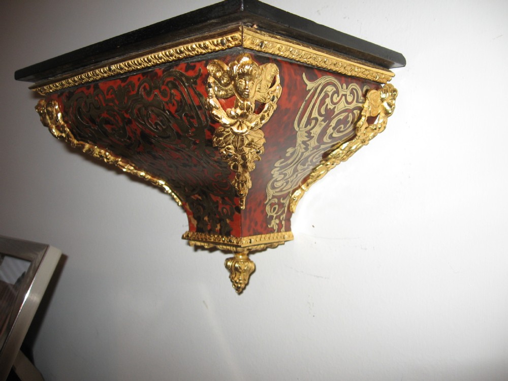 Antique red boulle clock and bracket View III