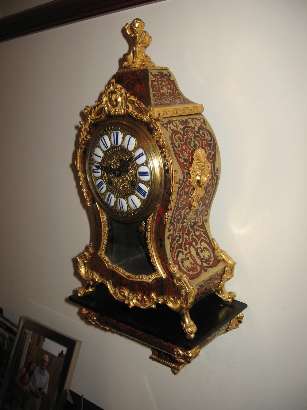 Antique red boulle clock and bracket View VII