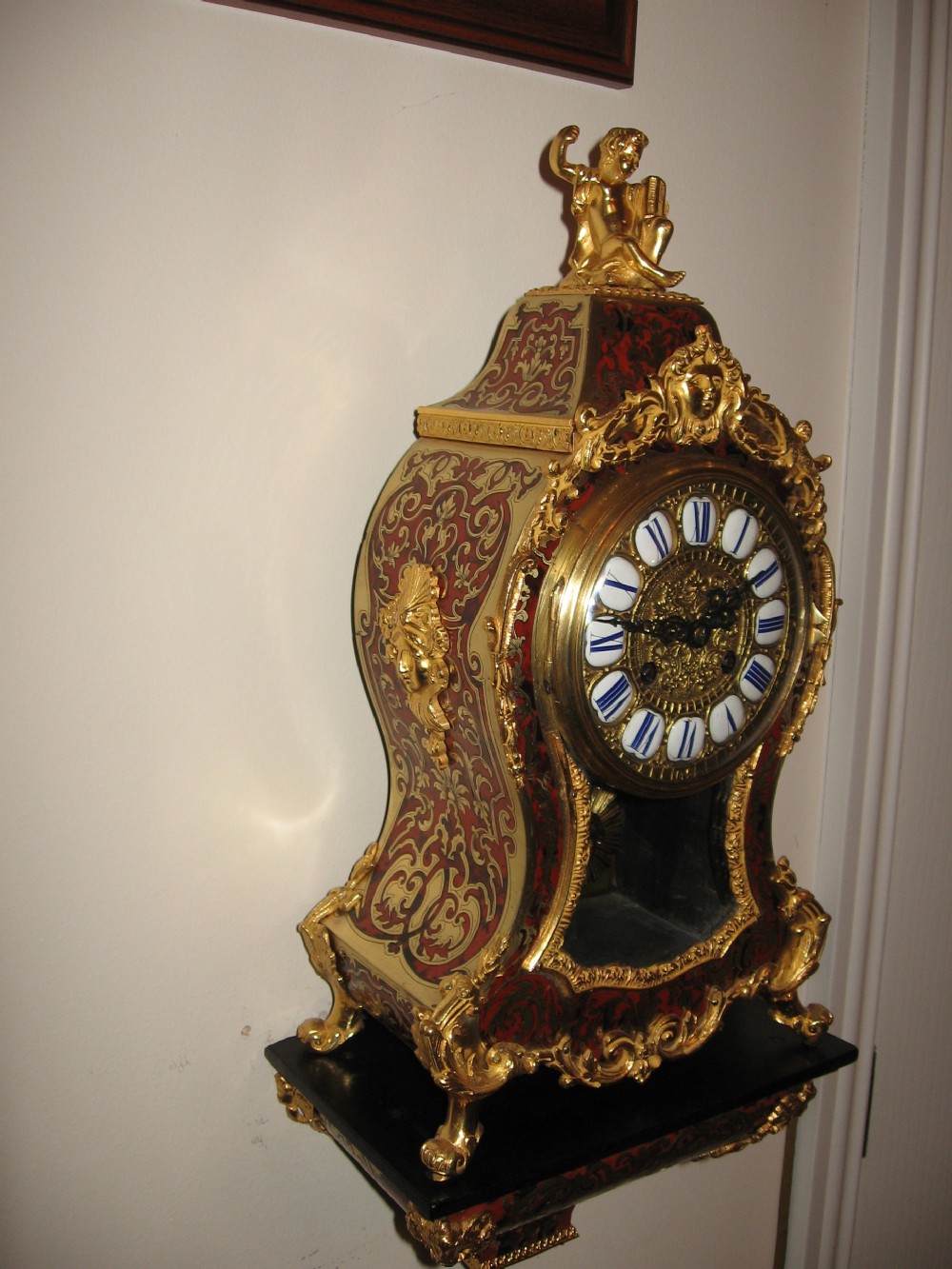 Antique red boulle clock and bracket View VIII