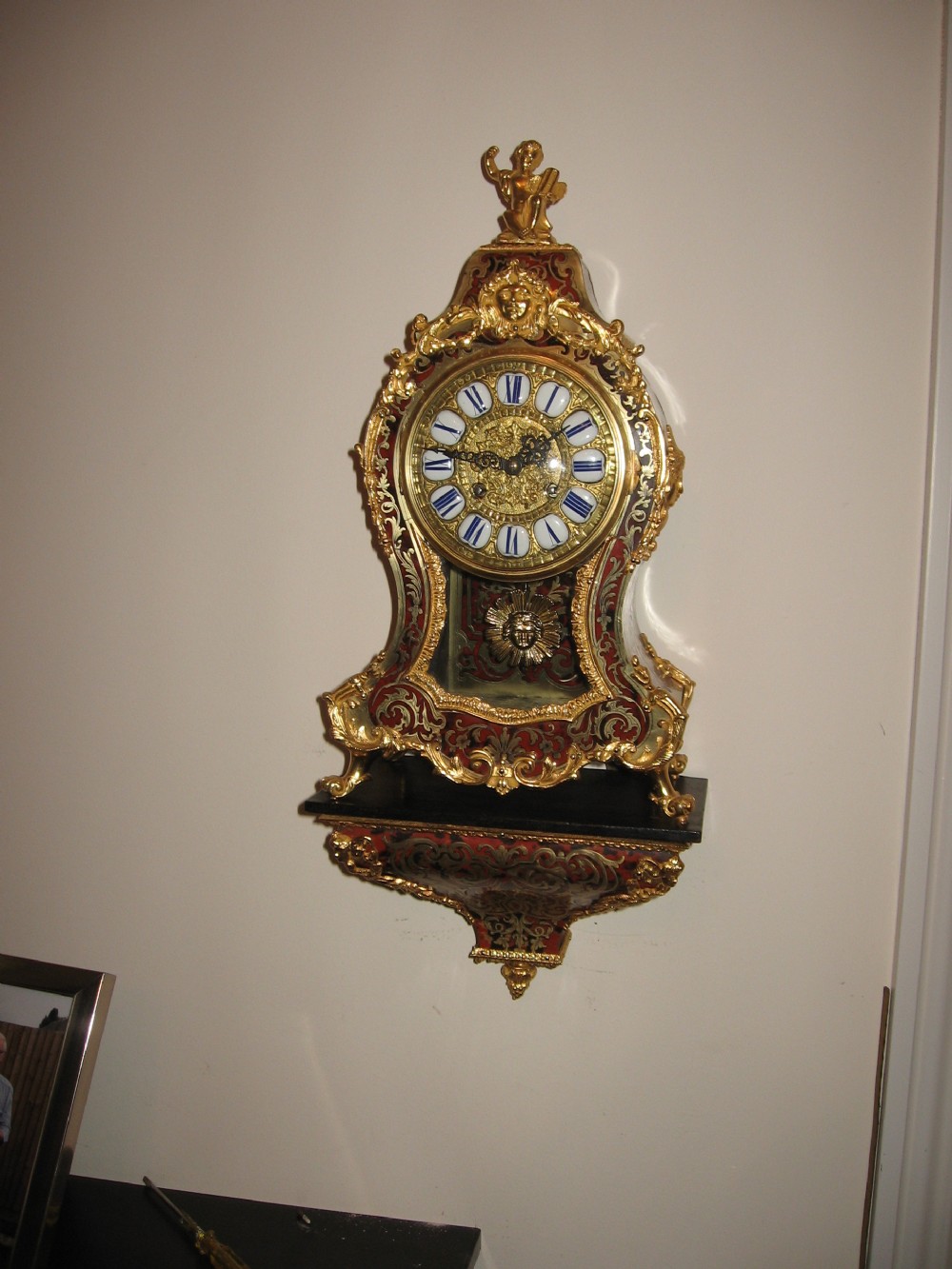 Antique red boulle clock and bracket View IX