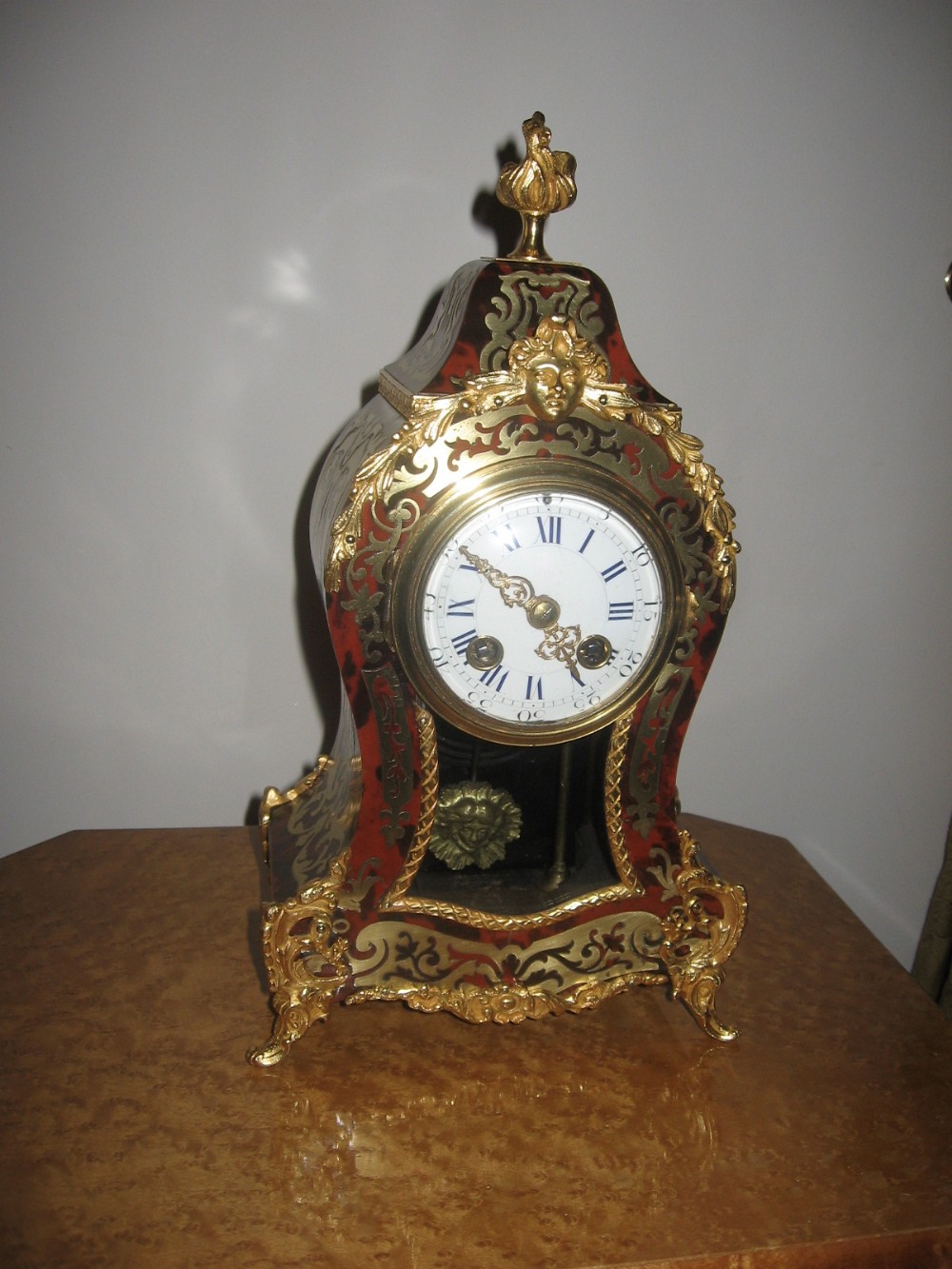 Antique boulle mantle clock.