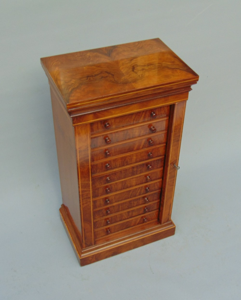 A rare miniature walnut wellington collectors chest  View II