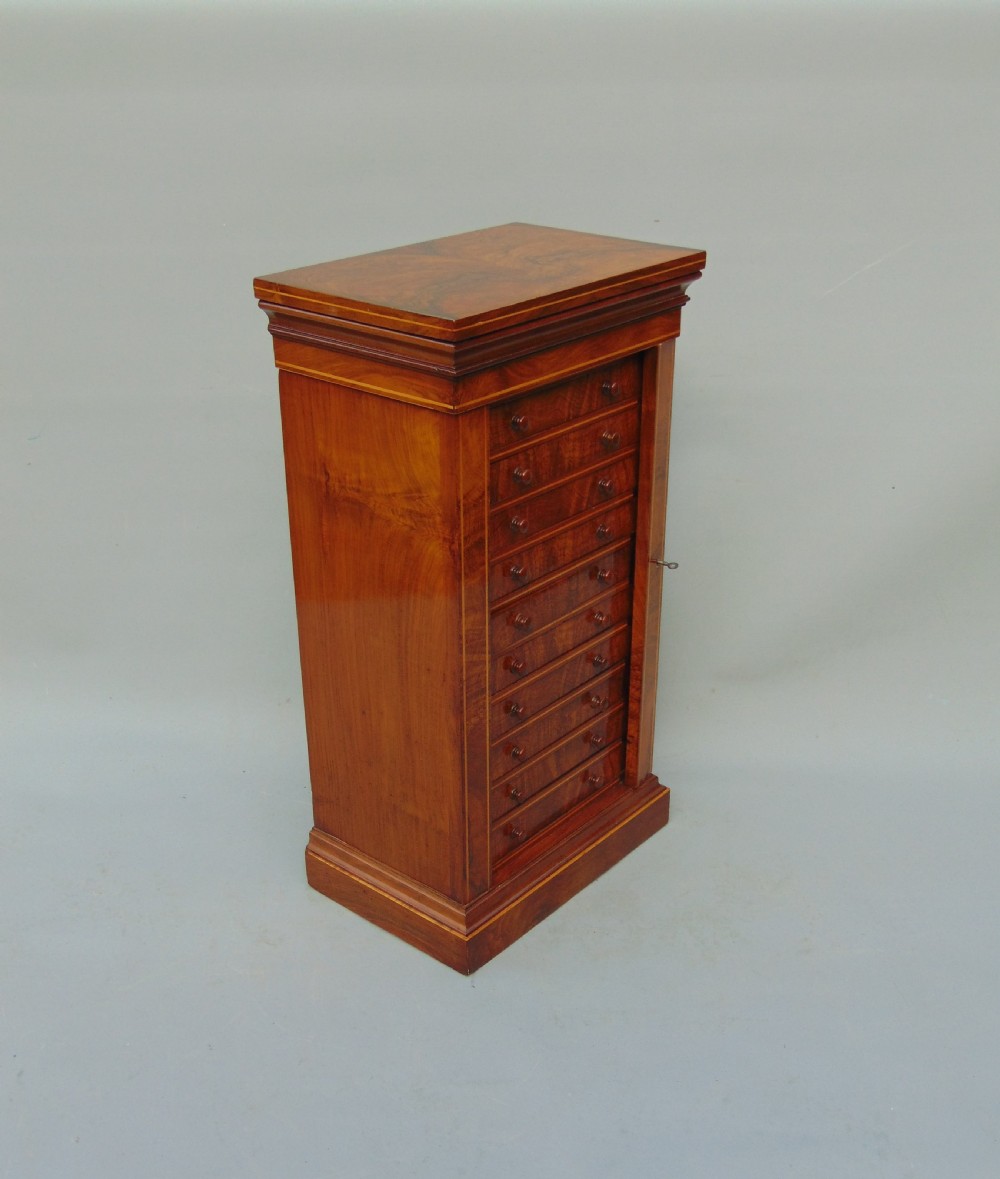 A rare miniature walnut wellington collectors chest  View III