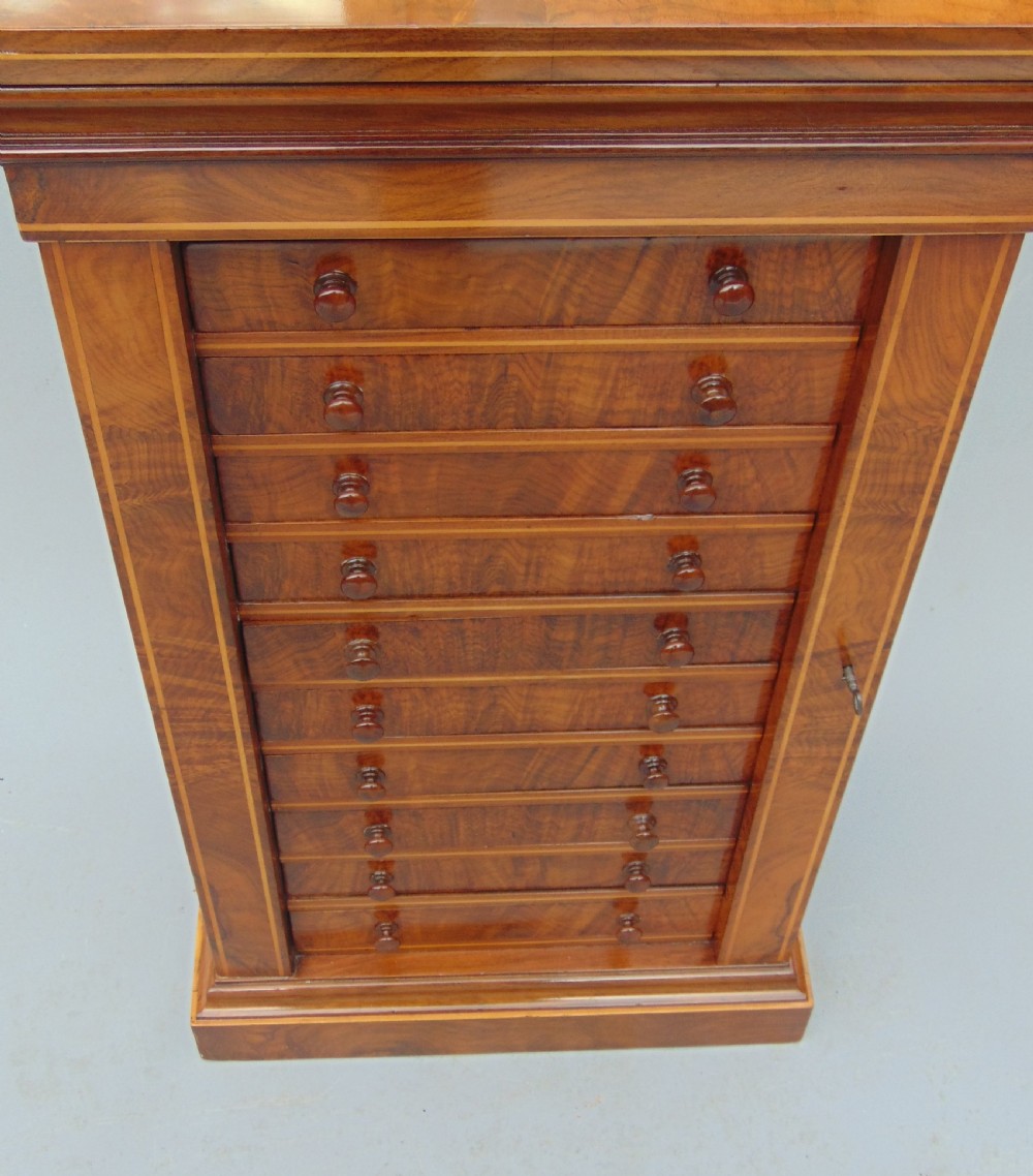 A rare miniature walnut wellington collectors chest  View IX