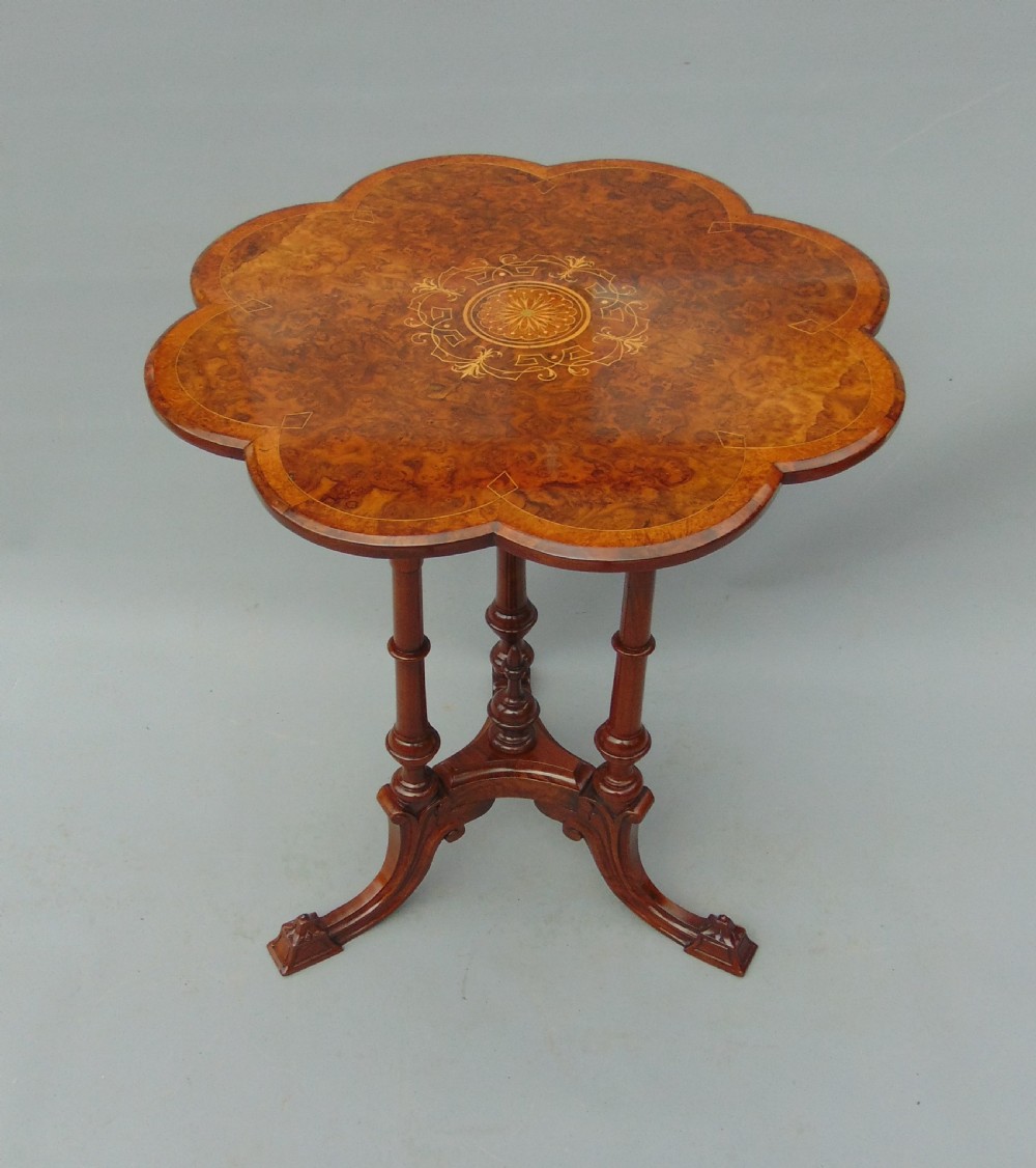 A walnut occasional table 