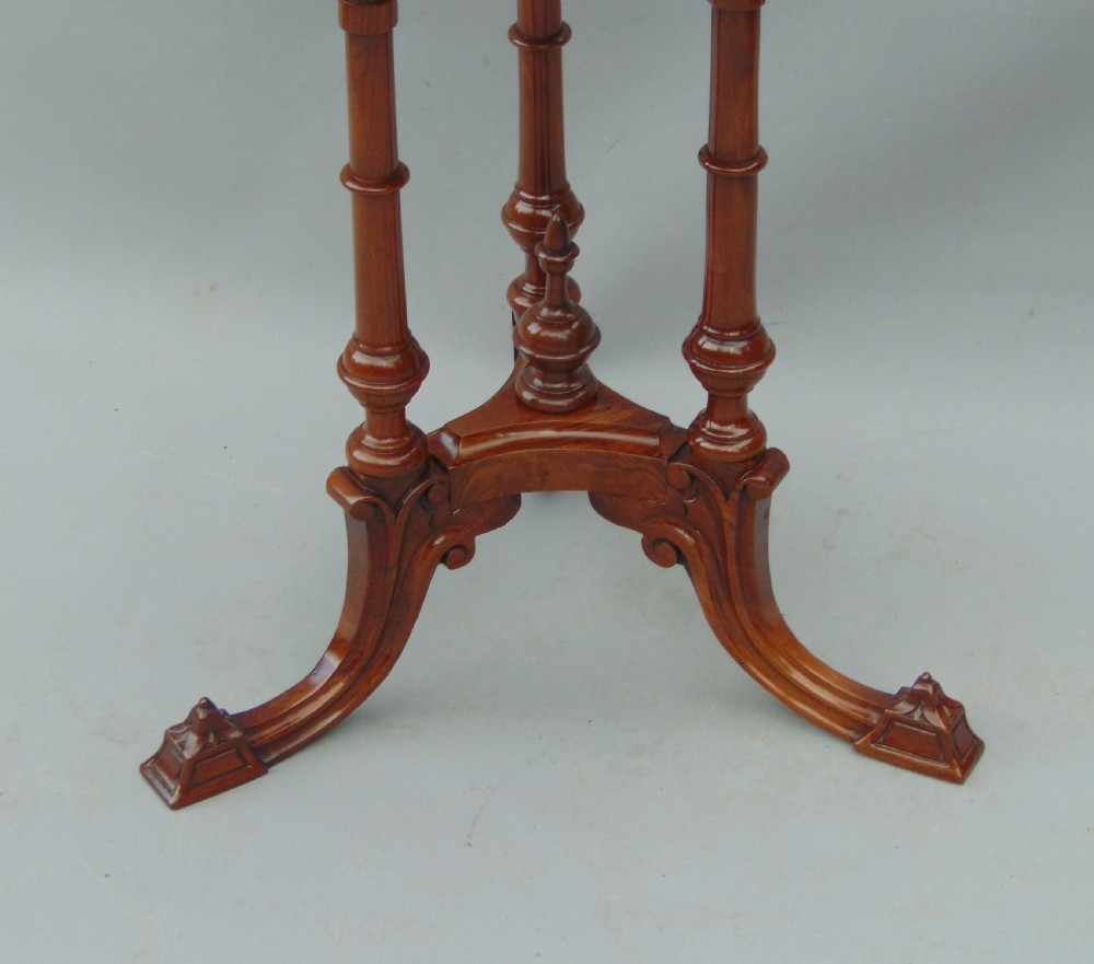 A walnut occasional table  View IV