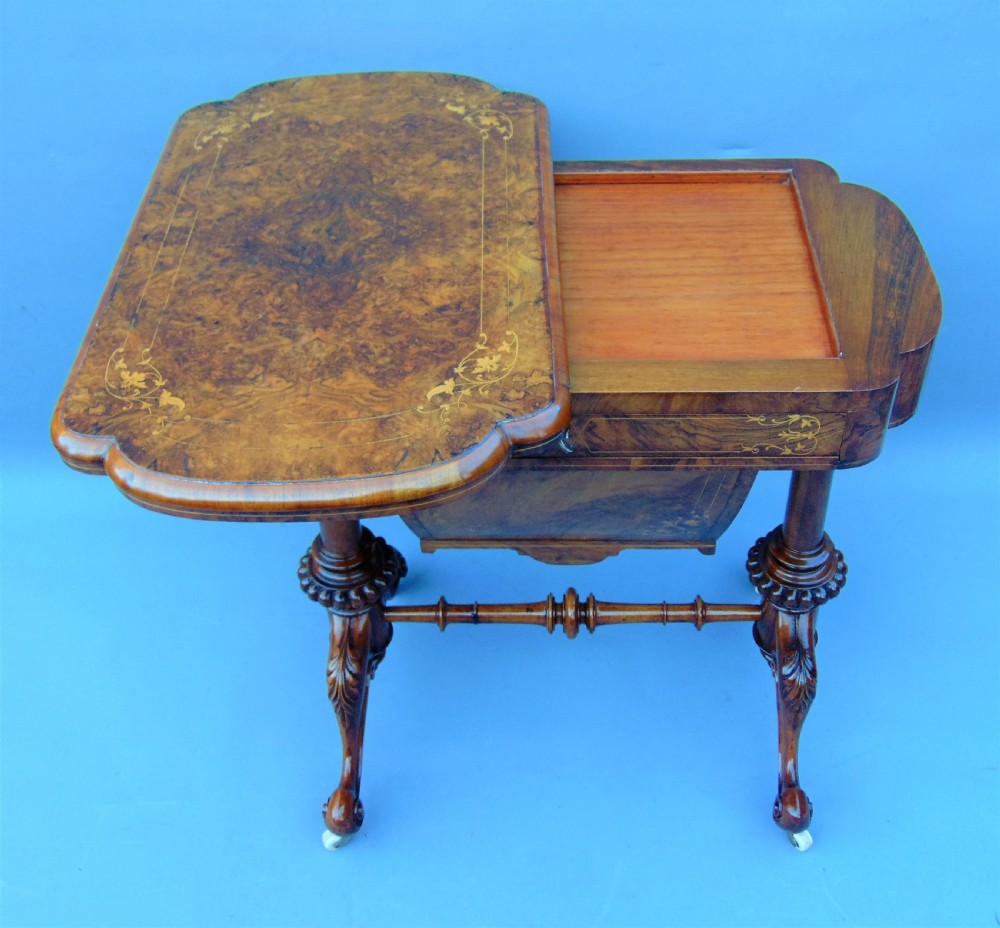 A fine English inlaid Burr Walnut Sewing games Table View II